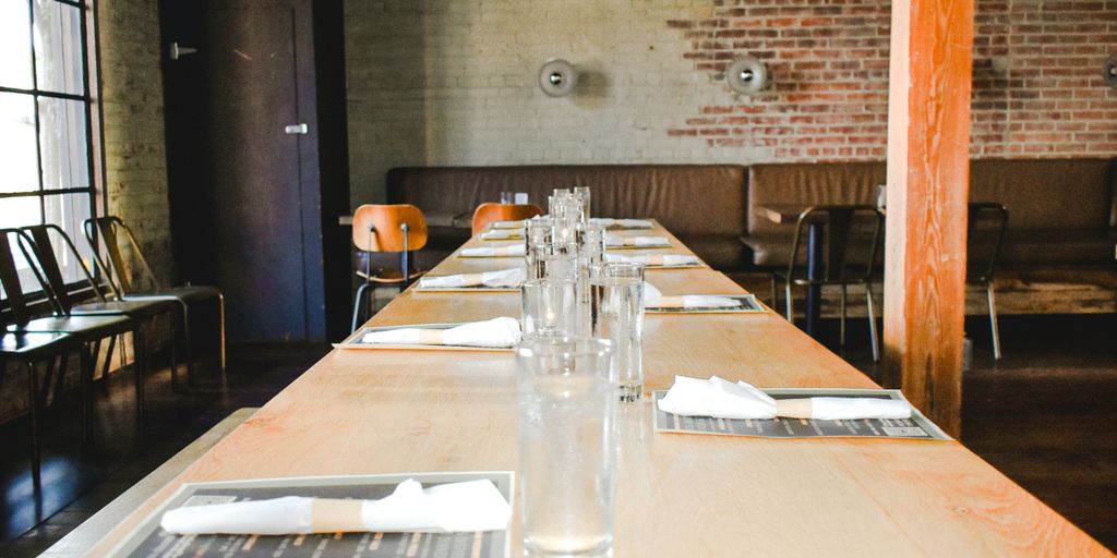 a table with empty glasses